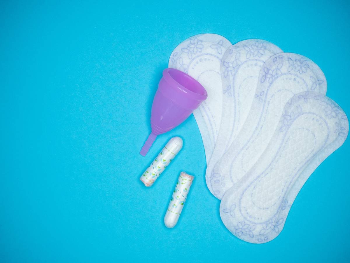 a blue background with a purple and white object and a purple and white object